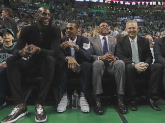 Feb 11, 2018; Boston, MA, USA; Former Boston Celtics (left to right) Kevin Garnett, Rajon Rondo, coach Doc Rivers and current general manager Danny Ainge look on during the second quarter of the game between the Boston Celtics and the Cleveland Cavaliers at TD Garden. Mandatory Credit: Winslow Townson-USA TODAY Sports