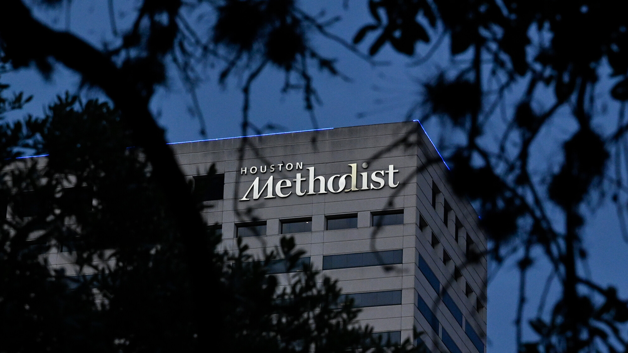 The Houston Methodist name is seen on one of the buildings in the Methodist Hospital system on Sunday