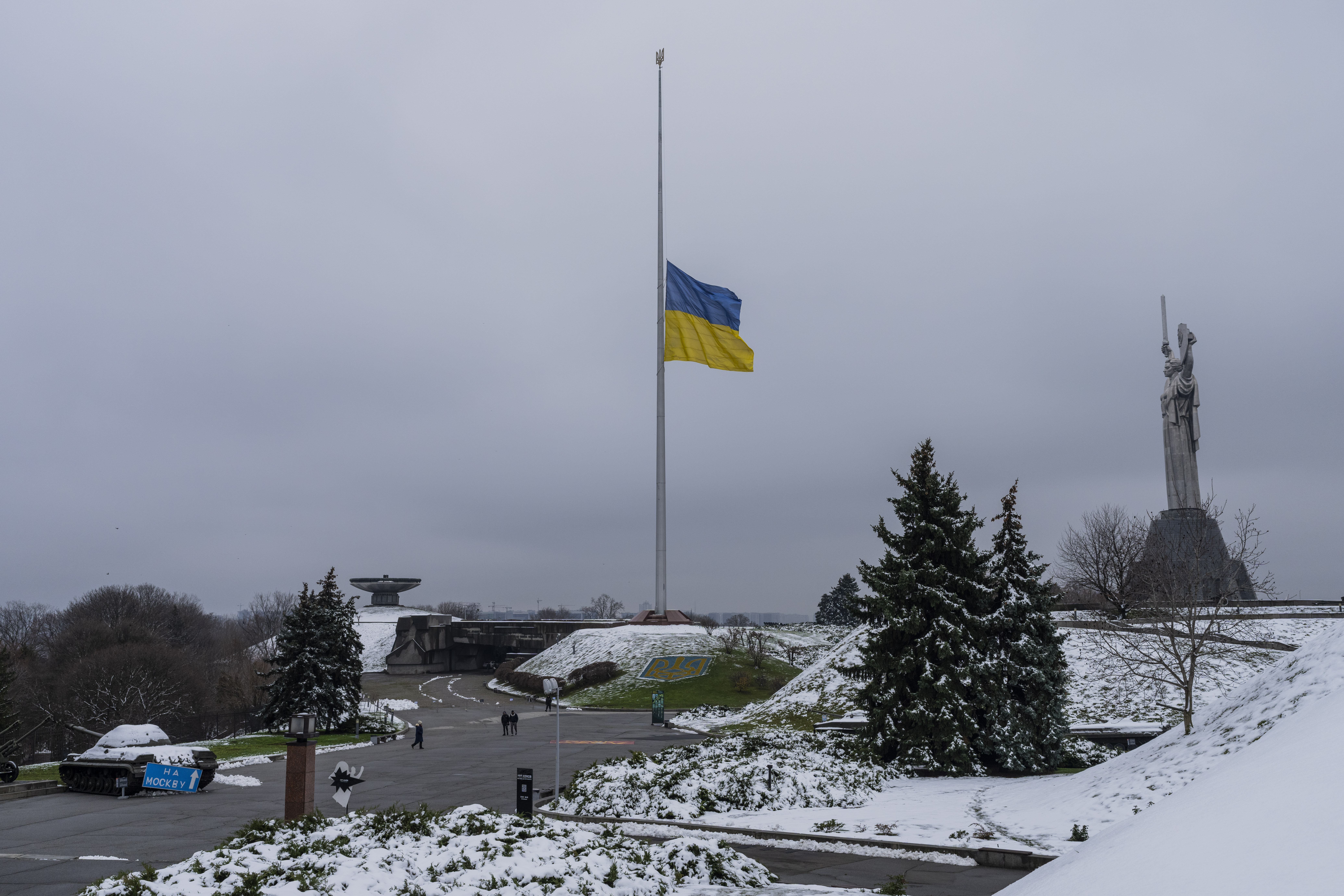 The Ukrainian flag flatters at half mast near the Ukrainian...
