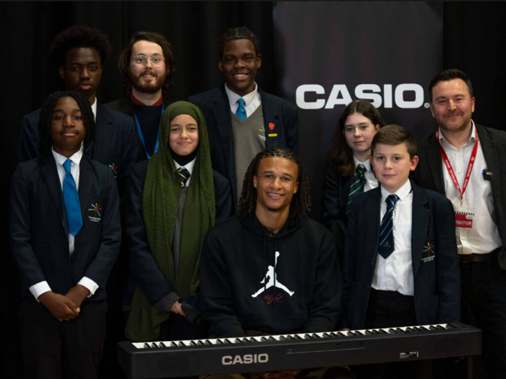 Manchester City’s Nathan Aké partners with Casio to donate pianos to disadvantaged schools